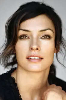 Famke Janssen como: Trillian St. James