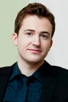 Joseph Mazzello como: John Deacon