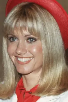 Olivia Newton-John como: Sandy Olsson