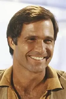 Gil Gerard como: Professor Meade