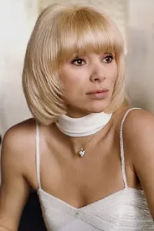 Mireille Darc como: Jacqueline (« Le Vison »)