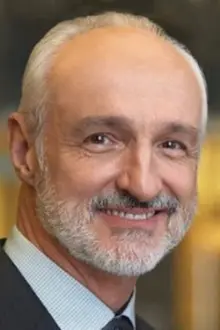 Michael Gross como: Tom