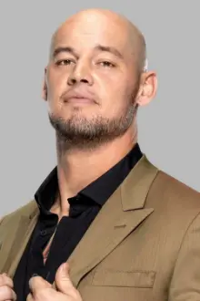 Thomas Pestock como: Baron Corbin