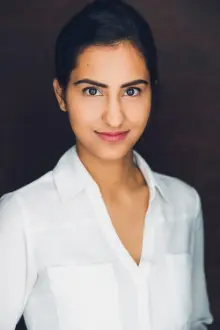 Amrit Kaur como: Bela Malhotra