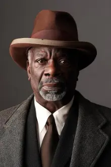 Joseph Marcell como: Roger Buck