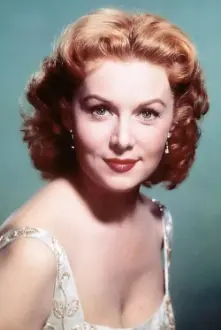 Rhonda Fleming como: June Lyons, Jansen's Secretary / Girlfriend