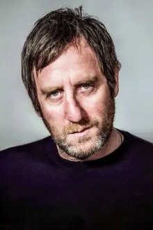 Michael Smiley como: 