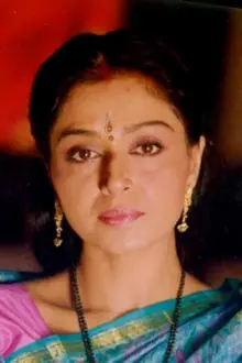 Beena Banerjee como: Beena