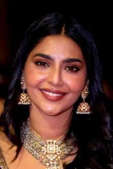 Aishwarya Lekshmi como: Santa Chandy / Peeli