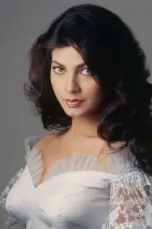 Kimi Katkar como: Reena