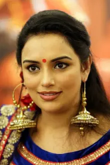 Shweta Menon como: Sarojini