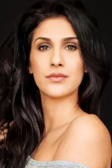 Parveen Dosanjh como: Amrita