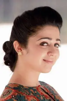 Charmy Kaur como: Actress