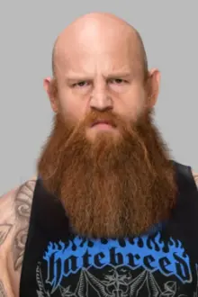 Joseph Ruud como: Erick Rowan