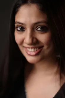 Veena Nandakumar como: 