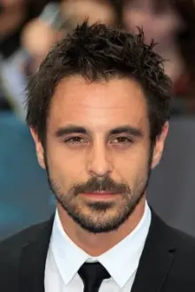 Emun Elliott como: Kenny