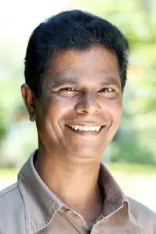 Indrans como: Radhakrishnan