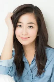 Yuka como: Miki Iida