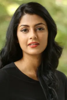 Anisha Ambrose como: 