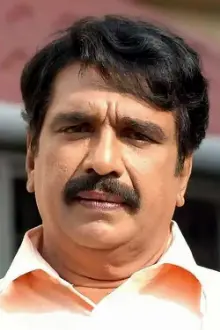 Cochin Haneefa como: Krishnakumar