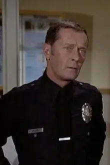 Fred Stromsoe como: Officer Woods