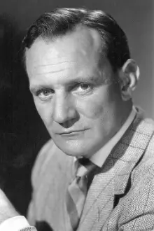 Trevor Howard como: Commander Frank Houghton