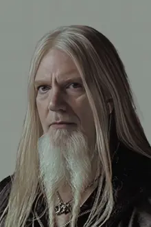 Marco Hietala como: bass guitar, clean male vocals