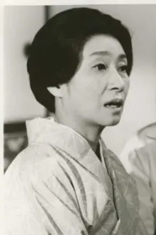 Hisano Yamaoka como: Yoshino, Tokizo's wife