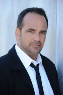 Robert Rusler como: Ron Grady