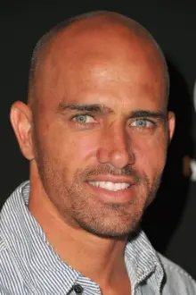 Kelly Slater como: Man On The Beach