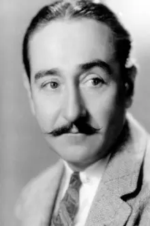 Adolphe Menjou como: Police Commissioner Thatcher Colt