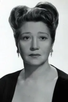 Fay Bainter como: Mrs. Elvira Wiggs