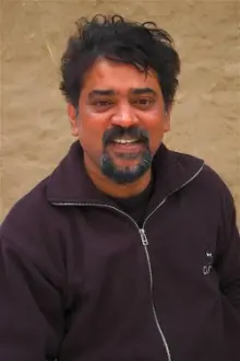 Santosh Sivan como: Ravi Varma