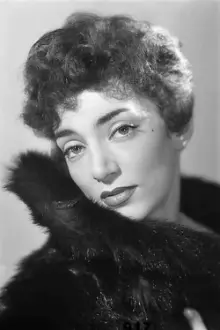 Micheline Dax como: Mme Lamour