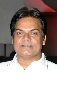 Akhilendra Mishra como: Babu Anna