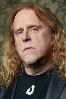 Warren Haynes como: Lead Guitar & Vocals