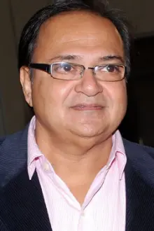 Rakesh Bedi como: Rakesh