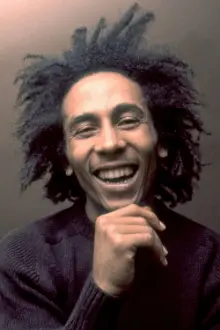 Bob Marley como: Vocals & Rhythm Guitar