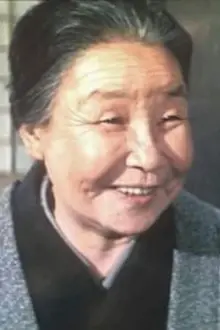 Chōko Iida como: Ritsuko, Takai's wife