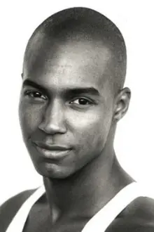 Vaughn Lowery como: Karel Andrews