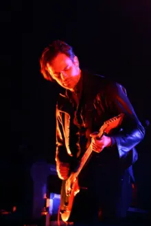 Dean Fertita como: Self - Backing Vocals/Keys/Guitar