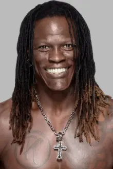 Ron Killings como: R-Truth - Host