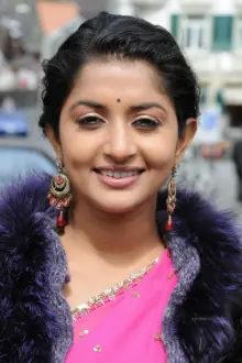 Meera Jasmine como: Lekha Tharoor