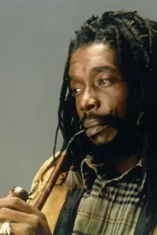 Peter Tosh como: Vocals & Lead Guitar