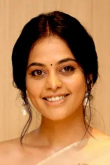 Bindu Madhavi como: Mithra Meenalochani