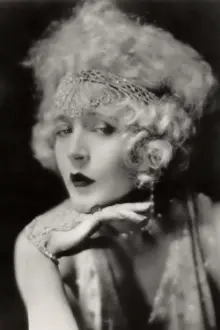 Mae Murray como: Della Arnold