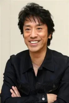 Toshio Kakei como: "Maru Megane"