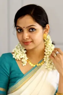 Samvrutha Sunil como: Annie Jacob