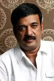 Anil Murali como: Thamban