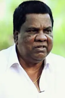 Mala Aravindan como: Purushothaman